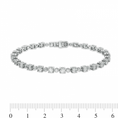 Золотой браслет с чередованием круглых бриллиантов разного диаметра