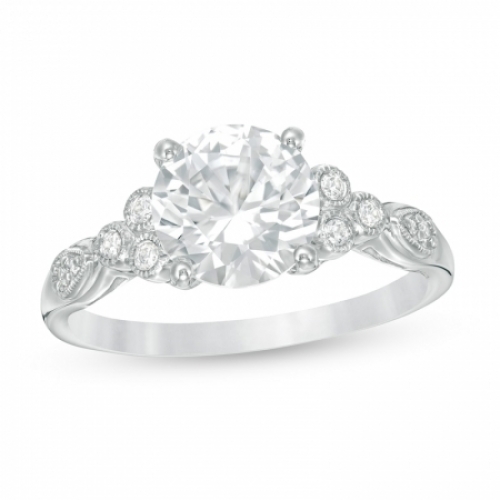 Помолвочное кольцо из белого золота с крупным белым сапфиром 8 мм и бриллиантами
