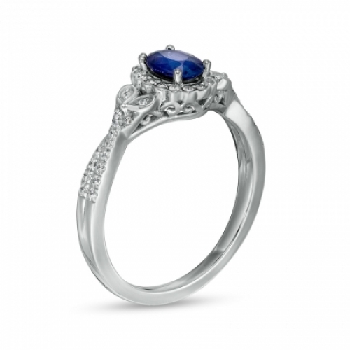 Помолвочное кольцо из белого золота  с  голубым сапфиром 6*4 мм огранки Овал и бриллиантами