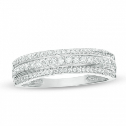 Обручальное кольцо из белого золота с тремя дорожками бриллиантов