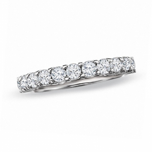 Обручальное кольцо из белого золота 750 пробы с бриллиантом