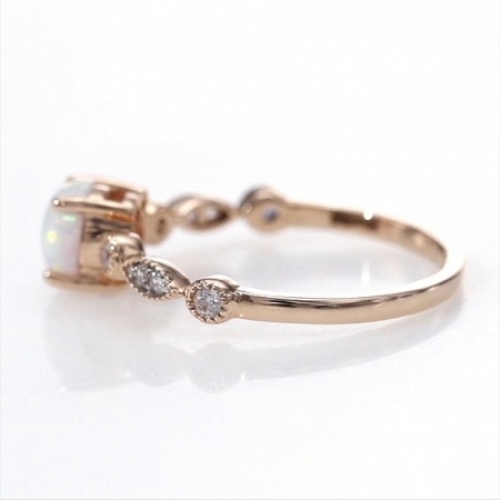 Женское кольцо из красного золота 585 пробы с опалом и бриллиантами