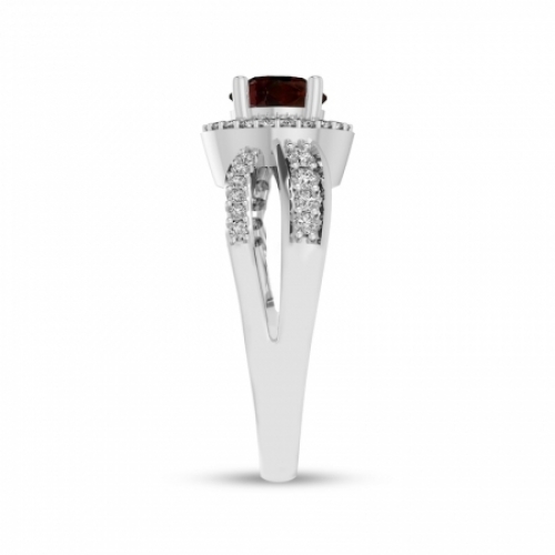 Женское кольцо из серебра с гранатом и белым сапфиром