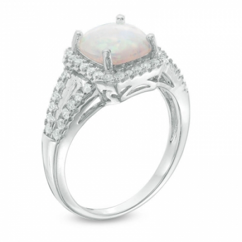 Женское кольцо из серебра с опалом и белым топазом