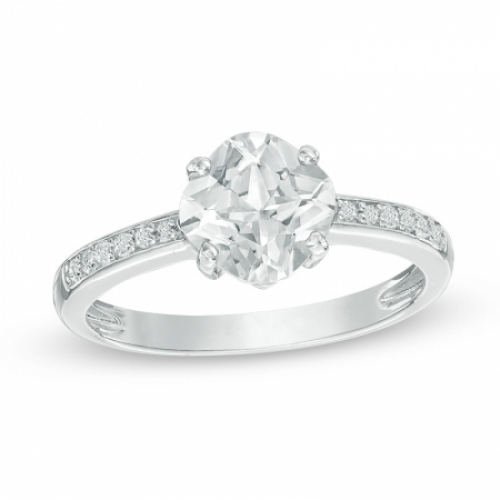 Женское кольцо из серебра с белыми топазами и белыми сапфирами