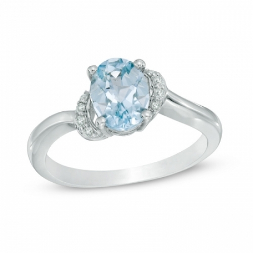 Женское кольцо из серебра с аквамарином и бриллиантом