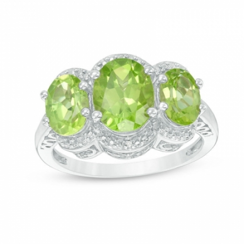 Женское кольцо из серебра с перидотом и бриллиантами