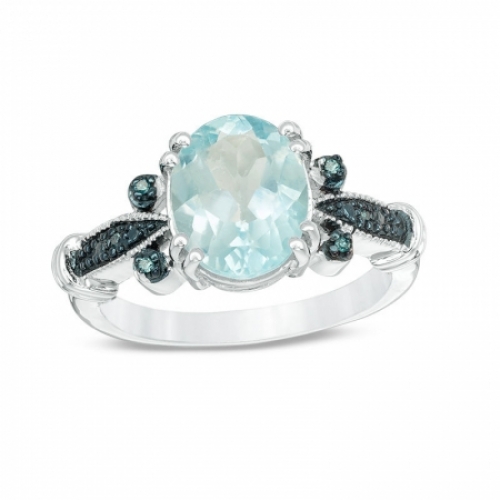 Женское кольцо из серебра с топазом и голубым бриллиантом