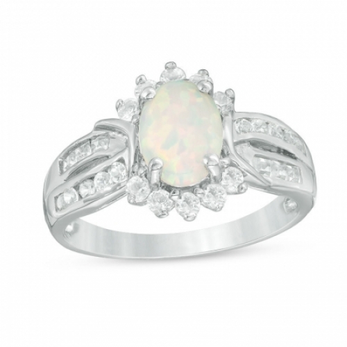Женское кольцо из серебра с опалом, белыми топазами и сапфирами