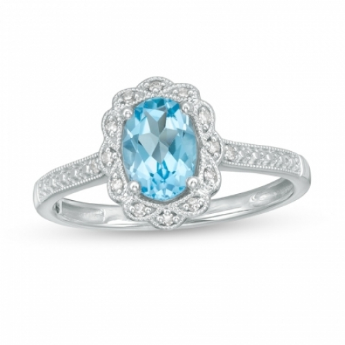 Женское кольцо из серебра с топазом, сапфиром и бриллиантами