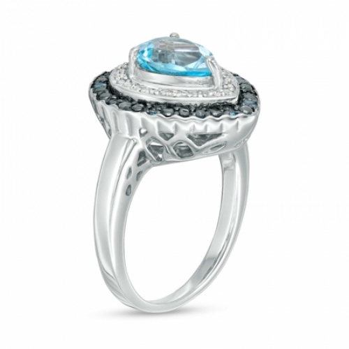 Женское кольцо из серебра с топазами бриллиантами
