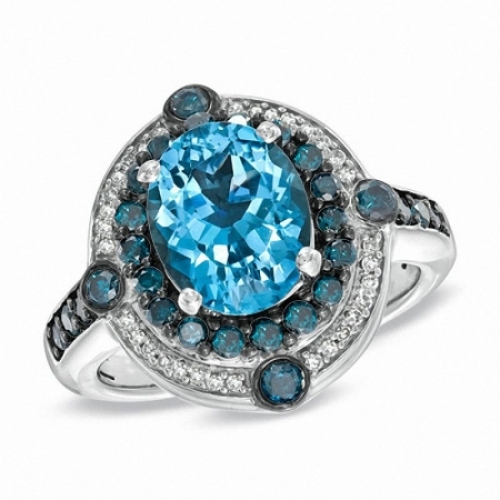 Женское кольцо из серебра с топазами бриллиантами