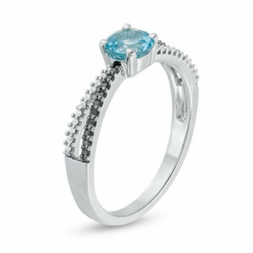 Женское кольцо из серебра с топазоми бриллиантами