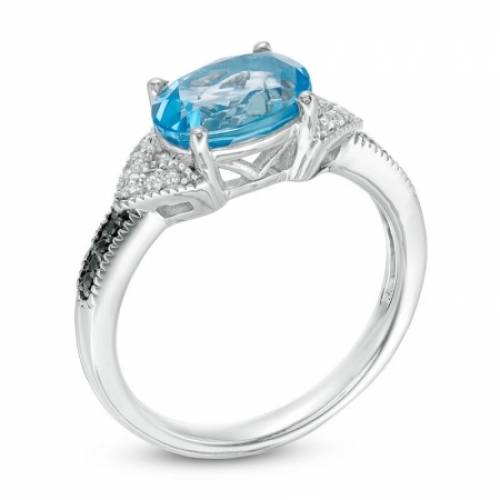 Женское кольцо из серебра с топазоми бриллиантами