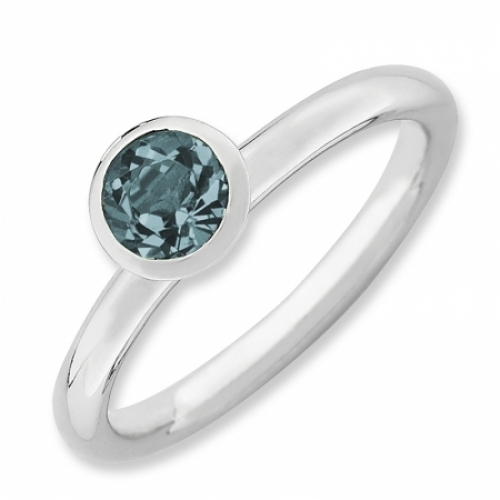 Женское кольцо из серебра с голубым кристаллом