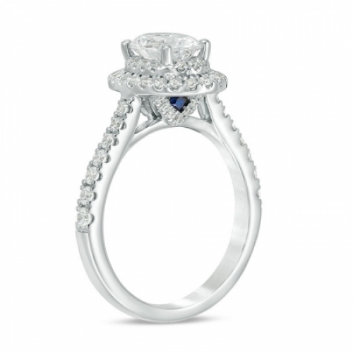 Женское кольцо из платины с сапфиром и бриллиантами