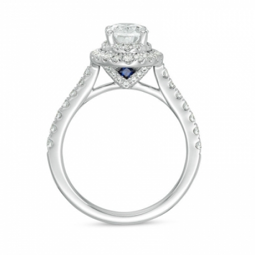 Женское кольцо из платины с сапфиром и бриллиантами