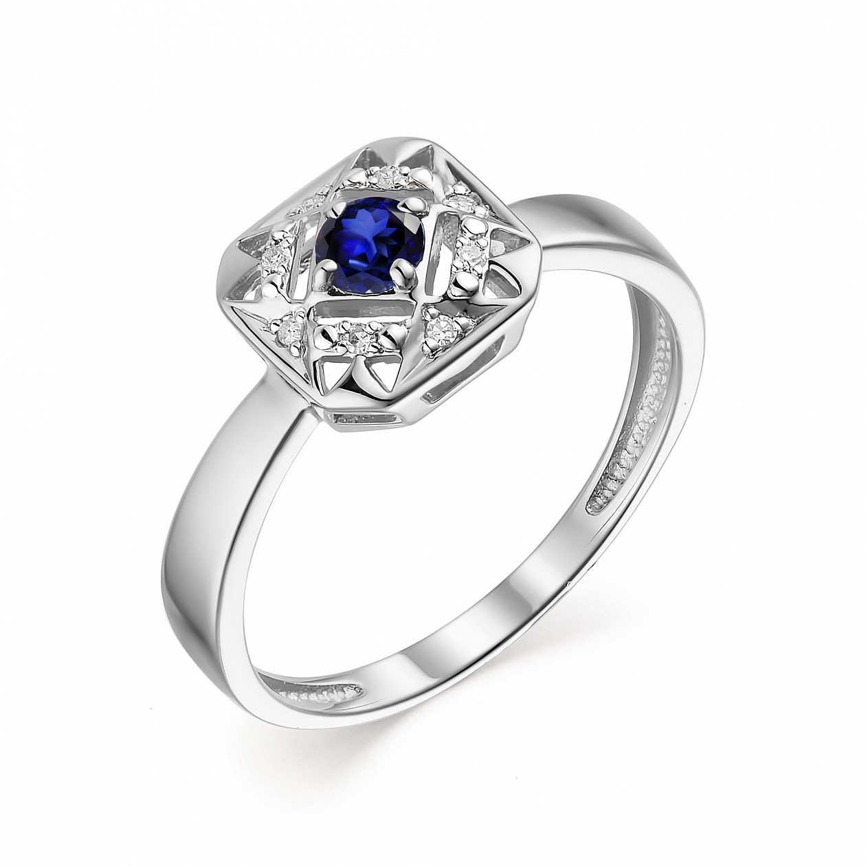 Женское кольцо из белого золота с сапфиром и бриллиантом