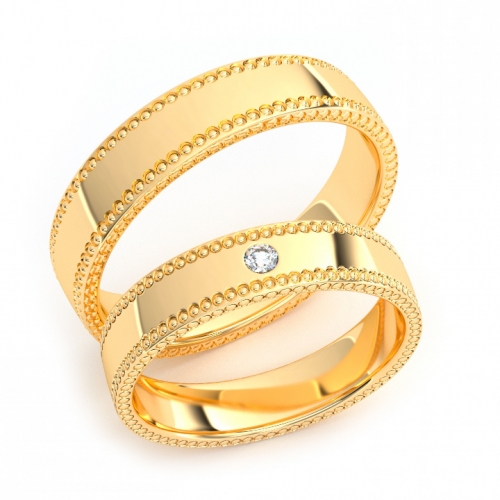 Золотые парные обручальные кольца из желтого золота 585 пробы с бриллиантом 0.3 карата (цена за пару)