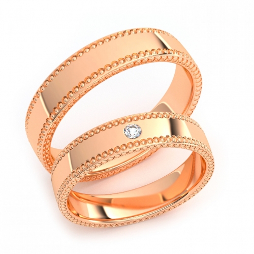 Золотые парные обручальные кольца из красного золота 585 пробы с бриллиантом 0.3 карата (цена за пару)