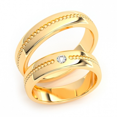 Золотые парные обручальные кольца из желтого золота 750 пробы с бриллиантом 0.05 карат (цена за пару)