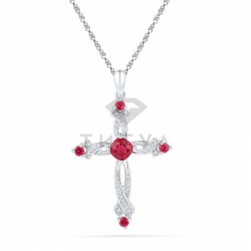 Декоративный крестик из серебра с рубином и бриллиантом