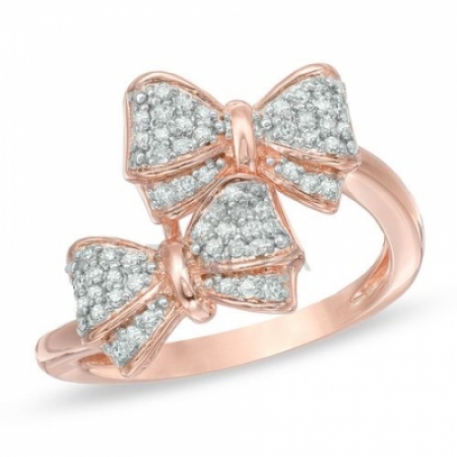 Бриллиантовое кольцо из серебра с бантиками