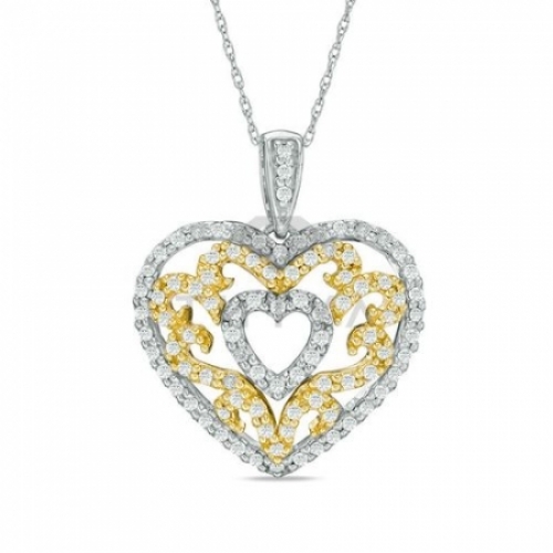 Подвеска в виде сердца из комбинированного золота с бриллиантом