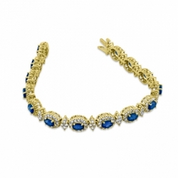 Золотой браслет с голубыми овальными сапфирами и круглыми бриллиантами