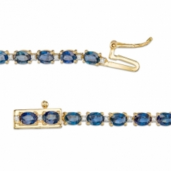 Золотой браслет с крупными овальными голубыми сапфирами и круглыми бриллиантами