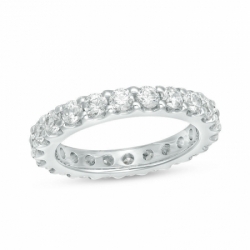 Обручальное кольцо из белого золота с большими бриллиантами по окружности