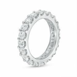 Обручальное кольцо из белого золота с крупными бриллиантами по окружности