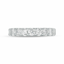 Обручальное кольцо из белого золота с крупными бриллиантами по окружности
