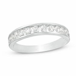 Обручальное кольцо из белого золота большими бриллиантами до середины шинки