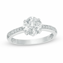 Женское кольцо из серебра с белыми топазами и белыми сапфирами