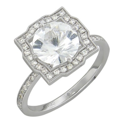 Женское кольцо из белого золота c топазом, бриллиантом