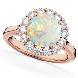Помолвочное кольцо из красного золота с опалом и бриллиантом