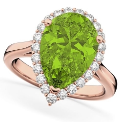 Помолвочное кольцо из красного золота с хризолитом и бриллиантом