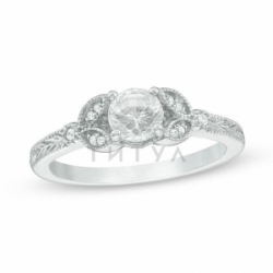 Помолвочное кольцо из серебра с белым сапфиром и бриллиантом