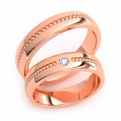 Золотые парные обручальные кольца из красного золота 750 пробы с бриллиантом 0.5 карат (цена за пару)